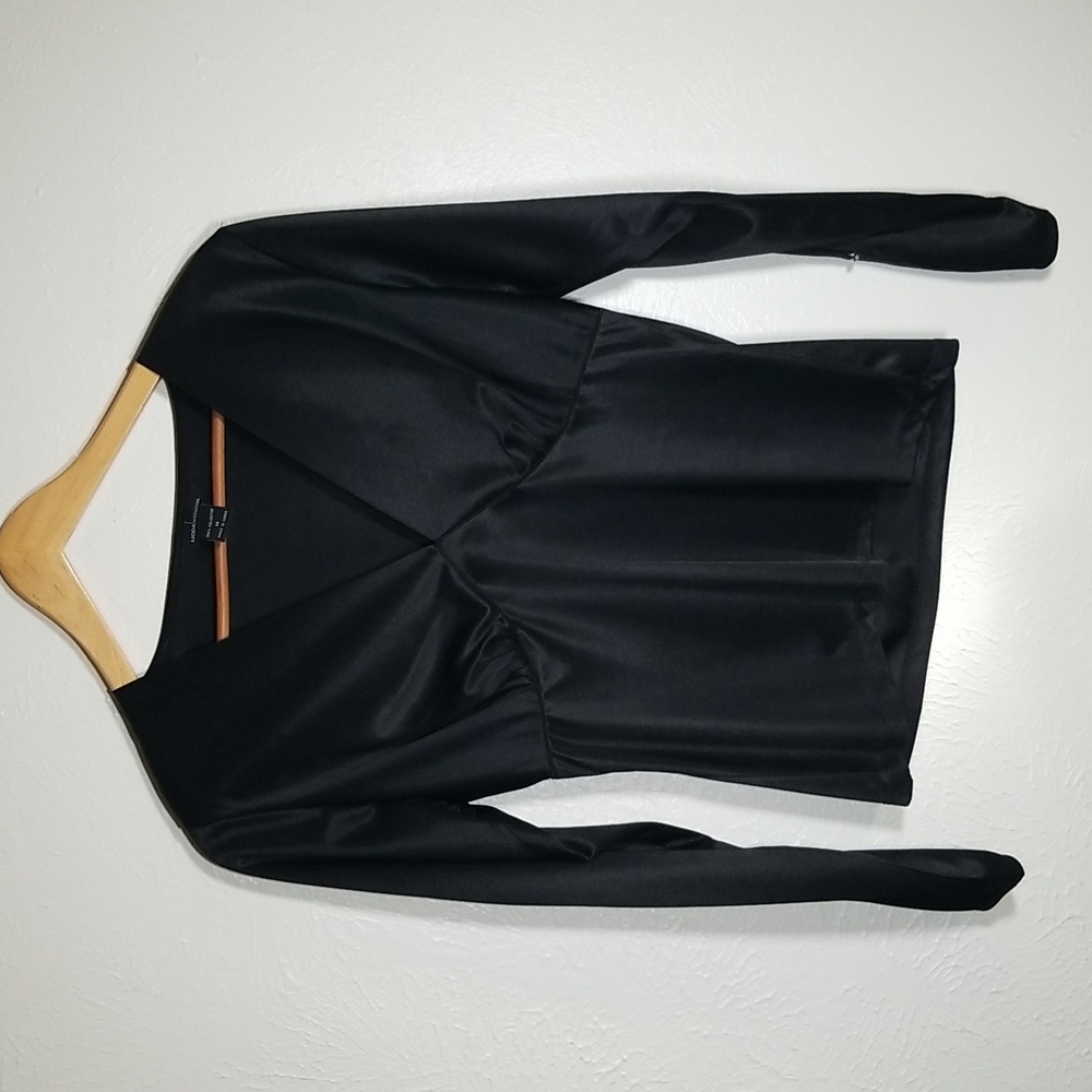 Black Top Long Sleeves that have slits with crystal buttons going down sleeves